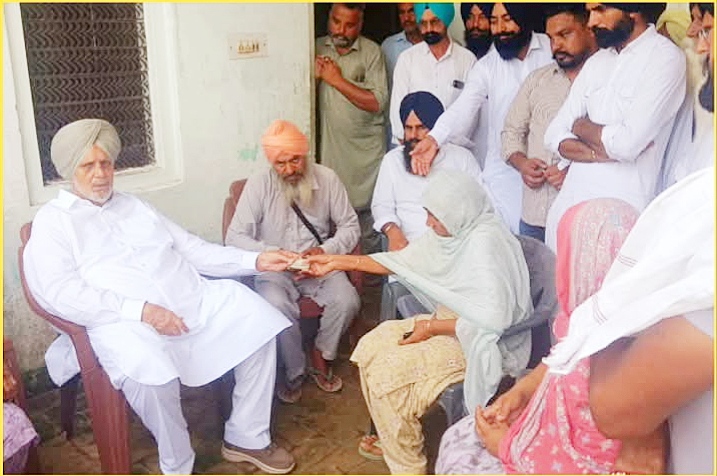 Janmeja Singh Sekhon provided financial assistance to the families whose houses and tubewells were damaged due to the broken drain in village Pitho.